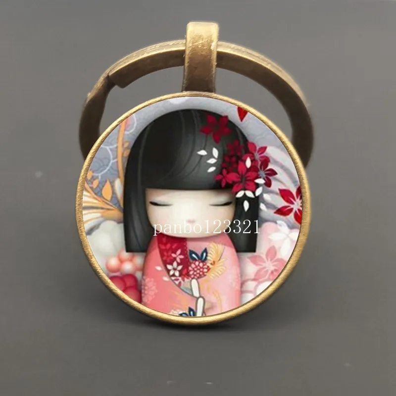 Fashion cute Japanese girl face keychain cute anime baby face woman car key ring holder charm pendant best friend gift