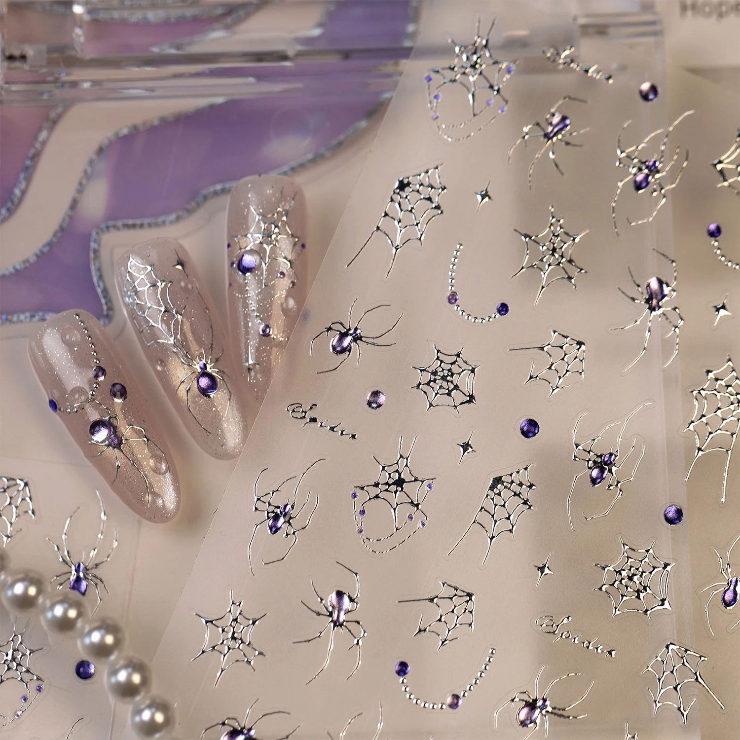 Gotische, ausgehöhlte Metall-Spinnennetz-Nagelaufkleber, 5D Silber-Lila Strass, Mond-Stern-geprägte Nagelsticker, Maniküre-Zubehör