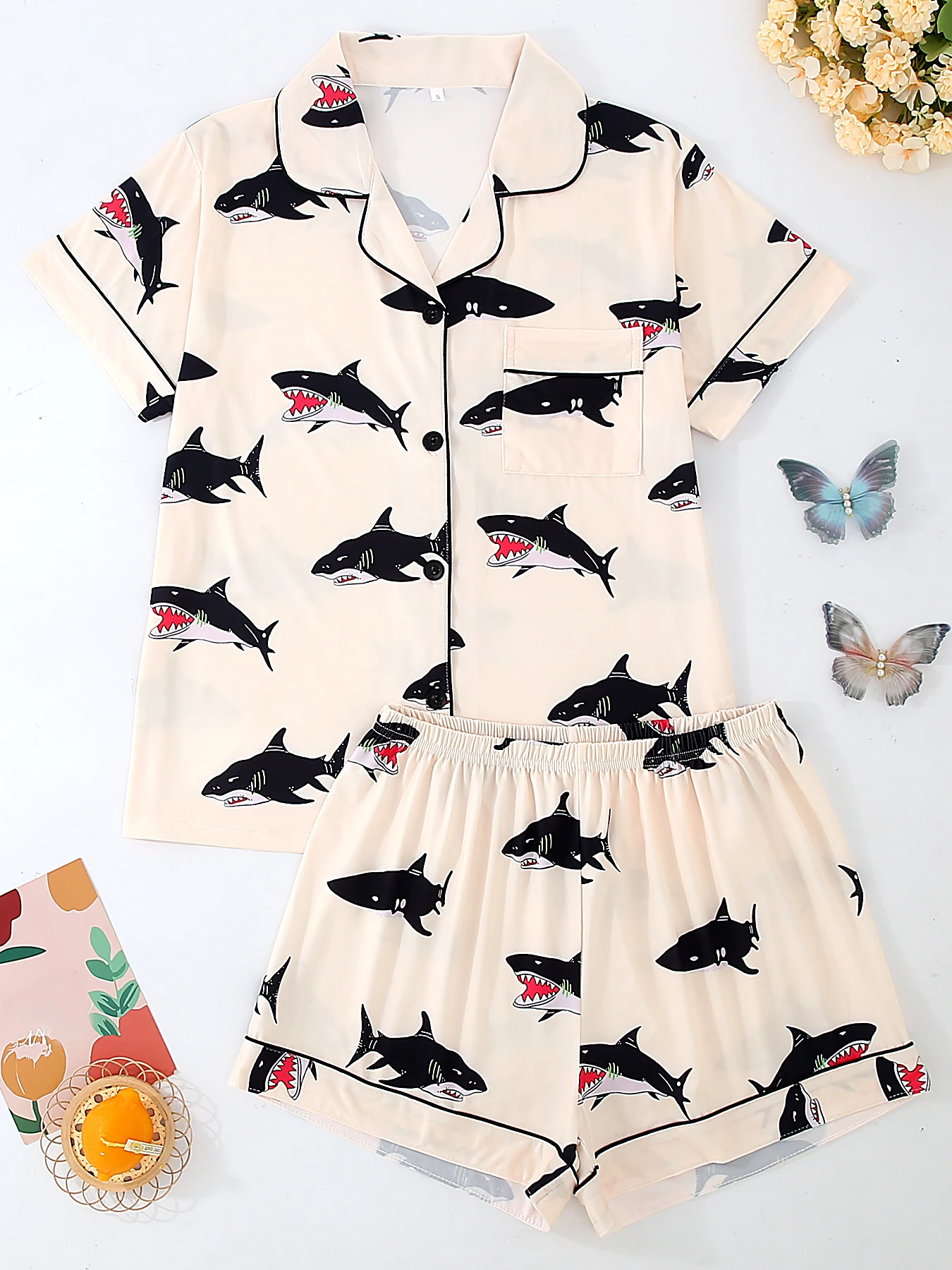 

Summer Cool 2-Piece Pajama Set for Women - Shark Pattern. Features a lapel short-sleeve button-front top and loose elastic-waist