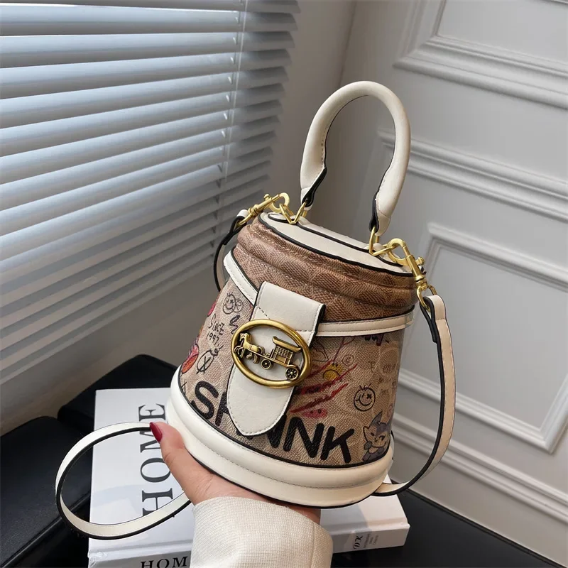 

2025 New Light Luxury Graffiti Bucket Bag - Cylinder Shape Fashion High-End Women's Shoulder Crossbody
