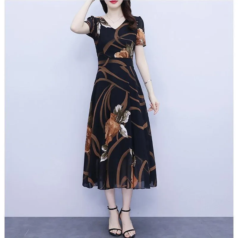 2023 New Summer Fashion Trend Commuting Minimalist V-neck Fresh Print Slimming Waist Covering Belly Casual Vacation Dress