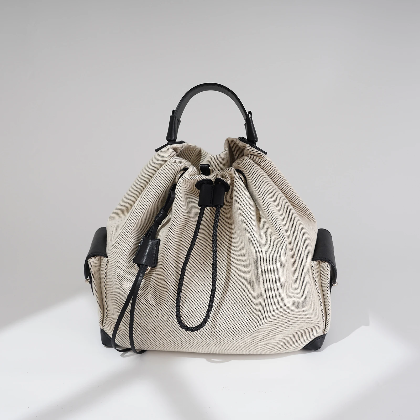 

Fashionable Women Backpack Denim Fabric with Cowhide Lady Travel Backpack Retro Drawstring Cowhide Large Back Pack