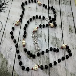 How to Pray the Santa Muerte Rosary Saint of death dead occult mexican death reaper jewelry skull skully offering sacrifice