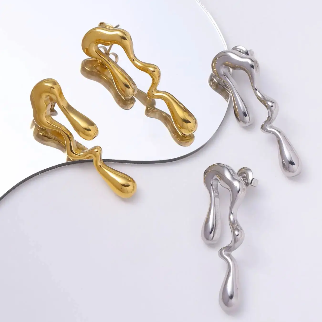CARLIDANA Unique Female Statement Stainless Steel Earrings Luxury Irregular Teardrop Asymmetric Melting Ice Design Stud Earrings