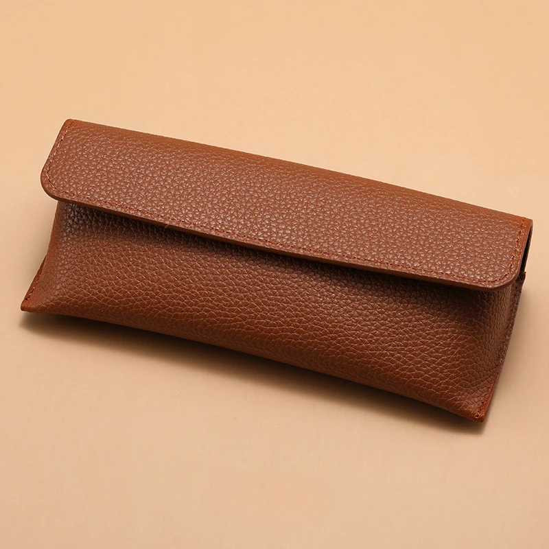 

Simple and fashionable leather bag-style soft-shell eyeglass case for women to carry their glasses daily