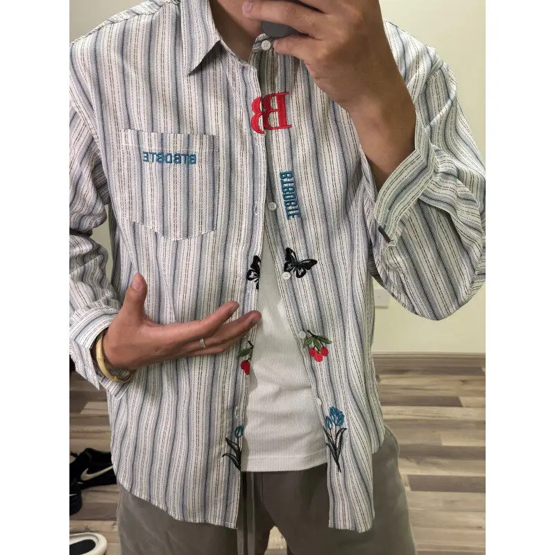 Simple embroidered striped shirt women's new spring design sense chic long-sleeved top coat