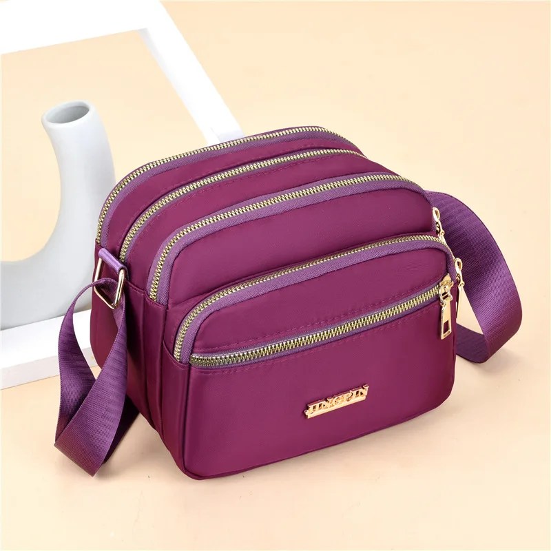 Bolsa feminina à prova dwaterproof água oxford pano coreia do japão ombro casual crossbody messenger bag náilon moblie telefone multi-camada espaço bolsa