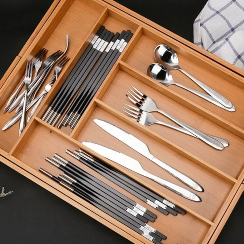 

Household knife and fork storage with built-in compartments in kitchen drawers