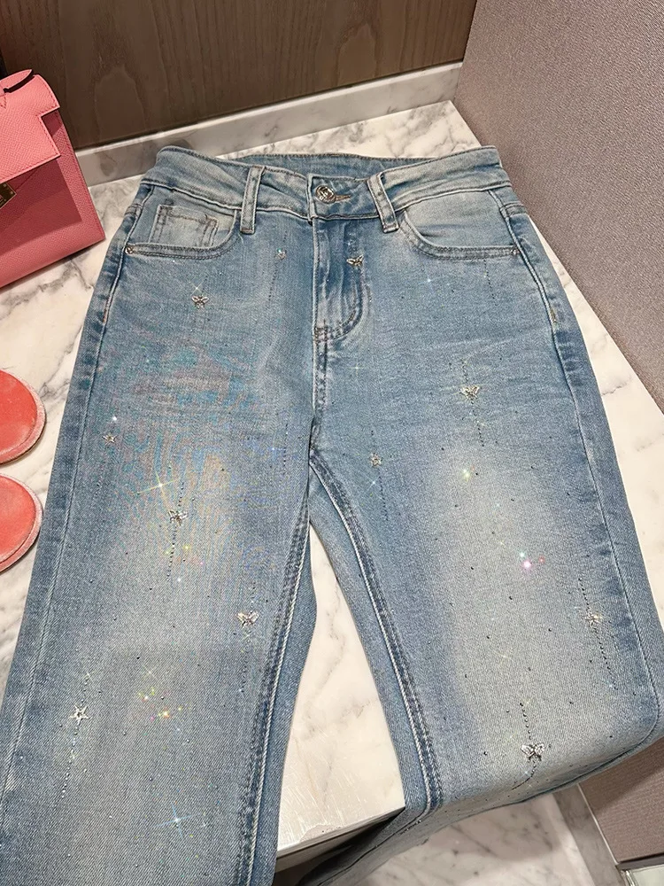 Style européen léger luxe lourd embelli diamant 2025 automne hiver taille haute jean évasé pour les femmes ajustement élastique pantalons longs