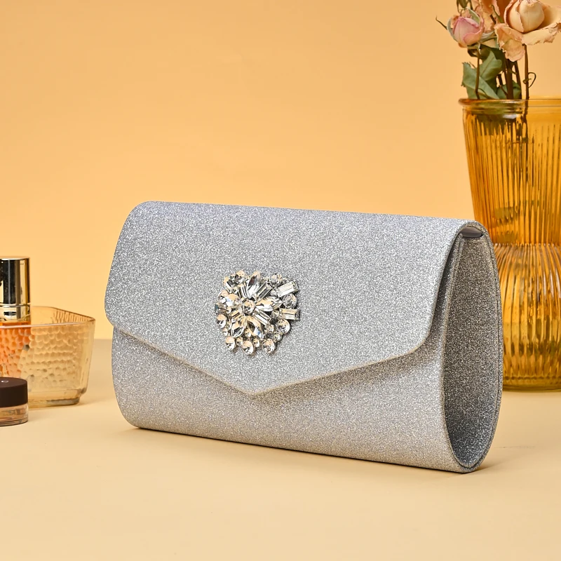 حقيبة سهرة عصرية أوروبية وأمريكية: حقيبة يد فضية مرصعة بالألماس مقترنة مع حقيبة فستان سهرة وسلسلة معدنية كرو