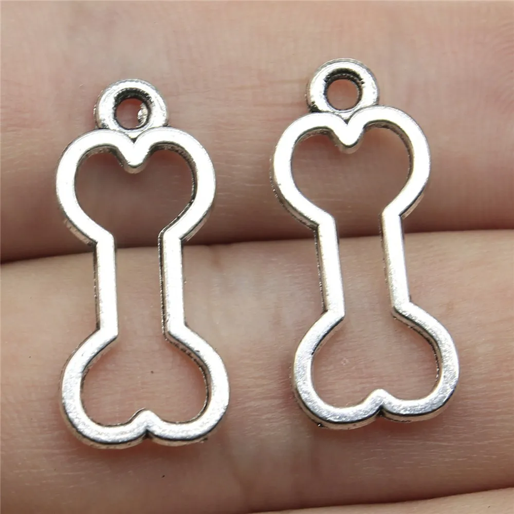 WYSIWYG 20pcs Charms Hollow Dog Bone 25x11mm Tibetan Bronze Silver Color Pendants Antique Jewelry Making DIY Handmade Craft