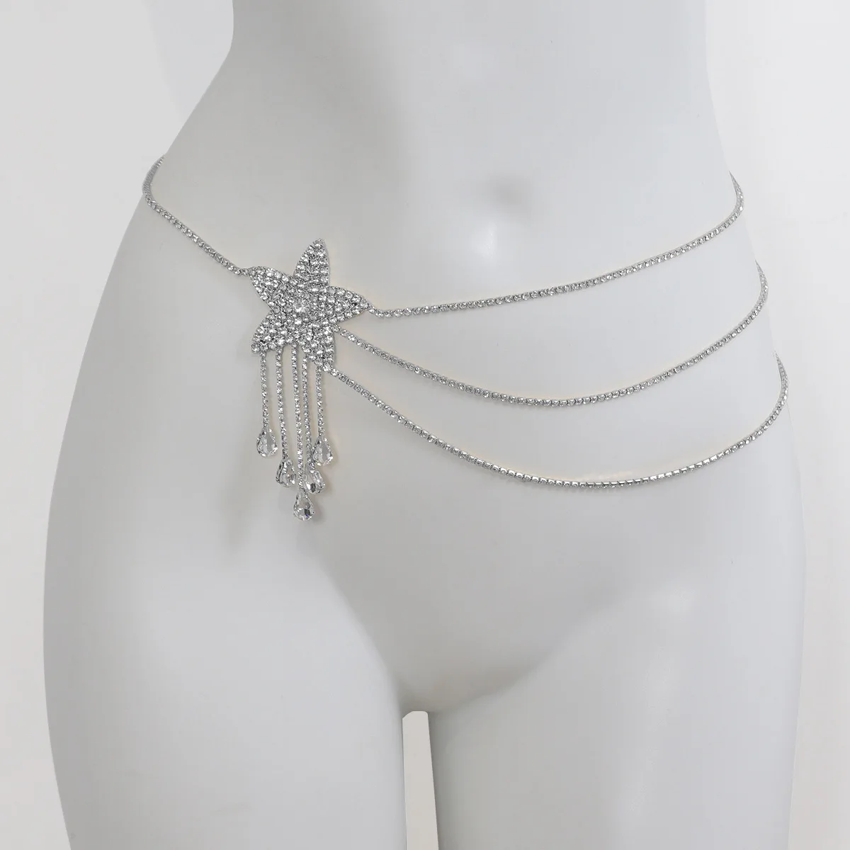 Cadena de cintura de diamantes de imitación en forma de estrella con borlas colgantes de gotas de agua a la moda para mujer, joyería de cadena corporal para club nocturno