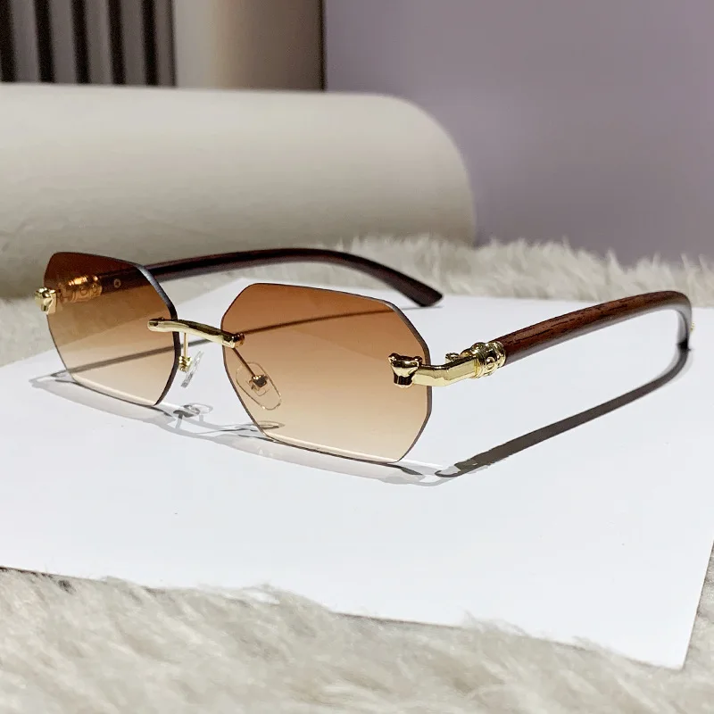 

Rimless cut edge polygon sunglasses for women retro imitation wood grain mirror legs Fashion brand designer clear gradient tone