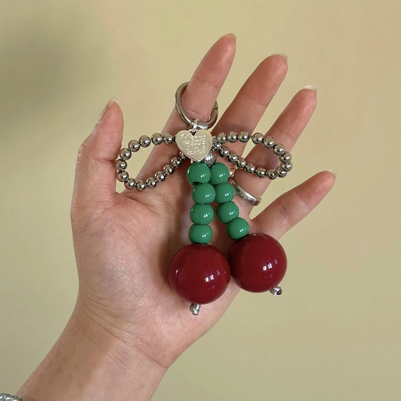 رائعة القوس الكرز سلاسل المفاتيح على ظهره قلادة الإبداعية جراب هاتف مفتاح سلسلة زوجين على ظهره قلادة الهدايا