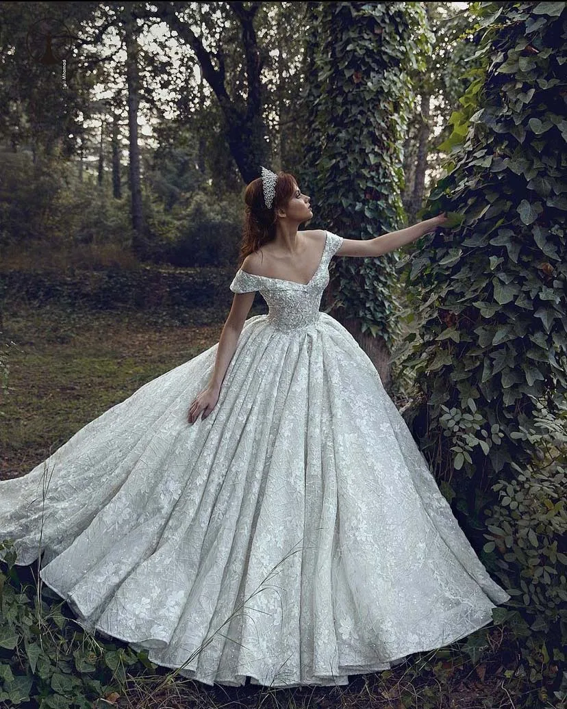 

2022 Designer Wedding Dresses Off the Shoulder Short Sleeve Bling Lace Puffy Vestidos De Novias
