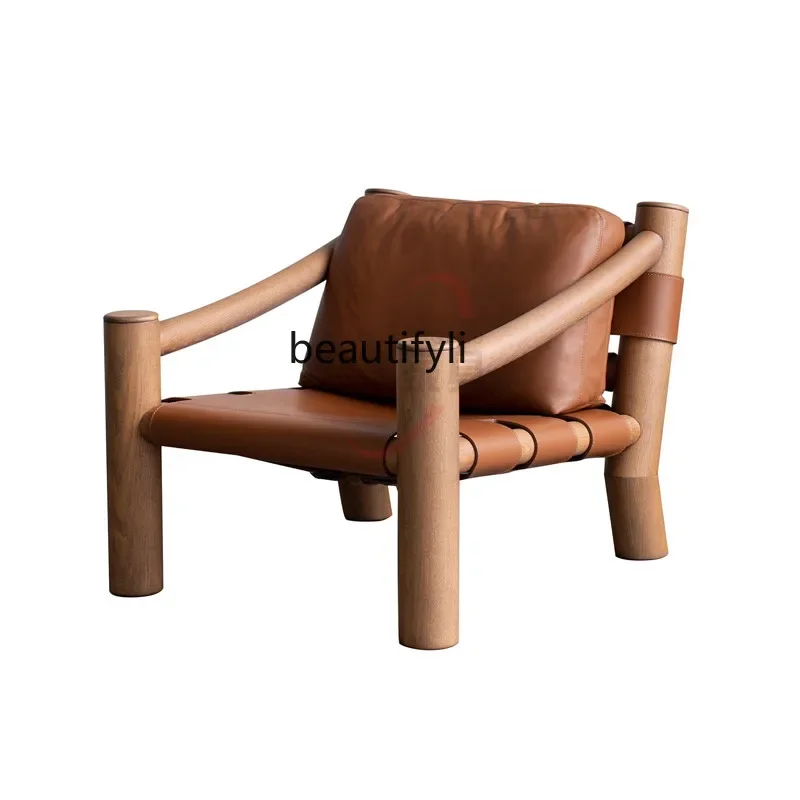 Simple modern designer creative solid wood armrest leisure chair new elephant leg leather sofa chair pedal combination