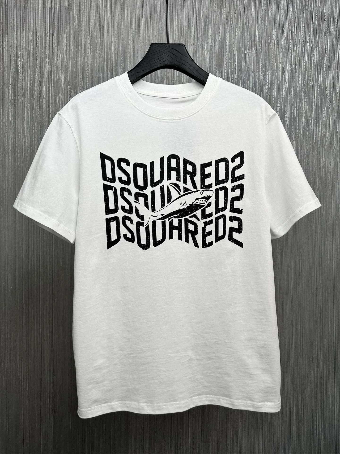 2025 Camisetas estampadas DSQ de moda de verano para hombres y mujeres son versátiles informales de algodón de alta calidad de manga corta