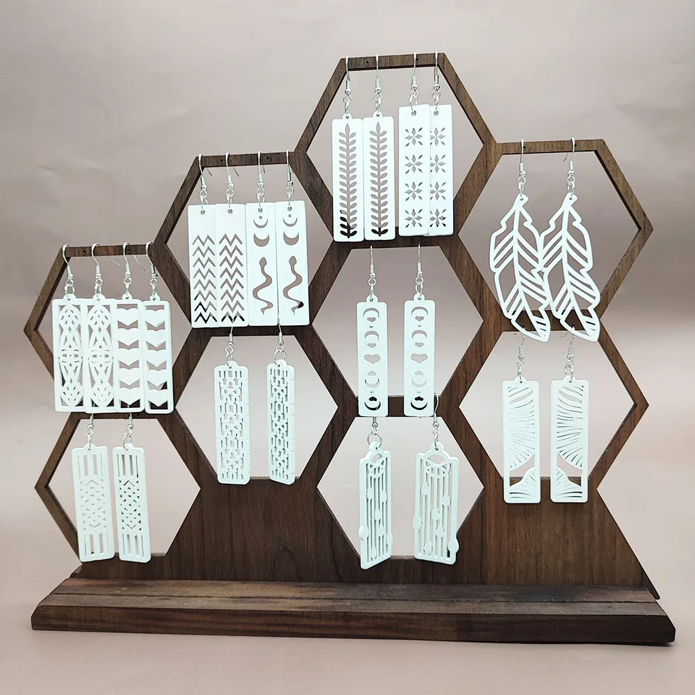 

12 pairs of white elegant women's earrings irregular symmetrical pattern wooden hollow pendant earrings Four seasons cool street