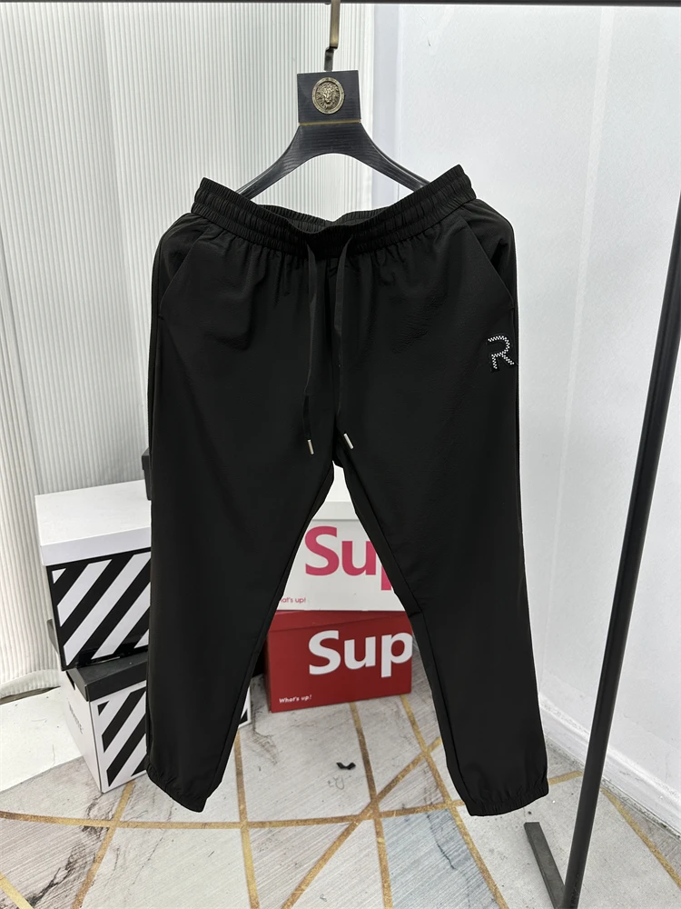 

Мужские повседневные брюки из быстросохнущей ткани с вышивкой, из пузырчатой ткани, с манжетами, модные городские, со средней посадкой, прямые штанины