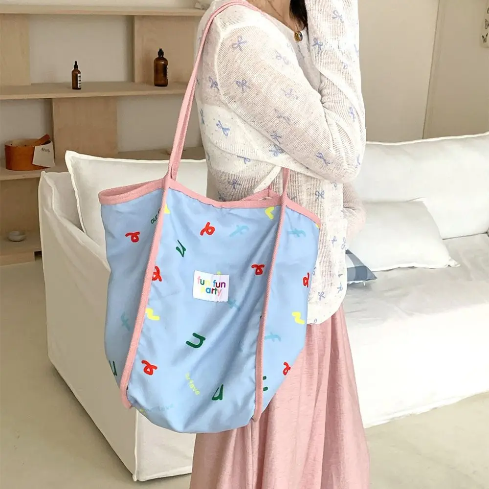 

Reusable Casual Chic Hobo Bag Lightweight Letter Cartoon Shopping Bag Portable Large Capacity Dopamine Color Basket Bag Unisex