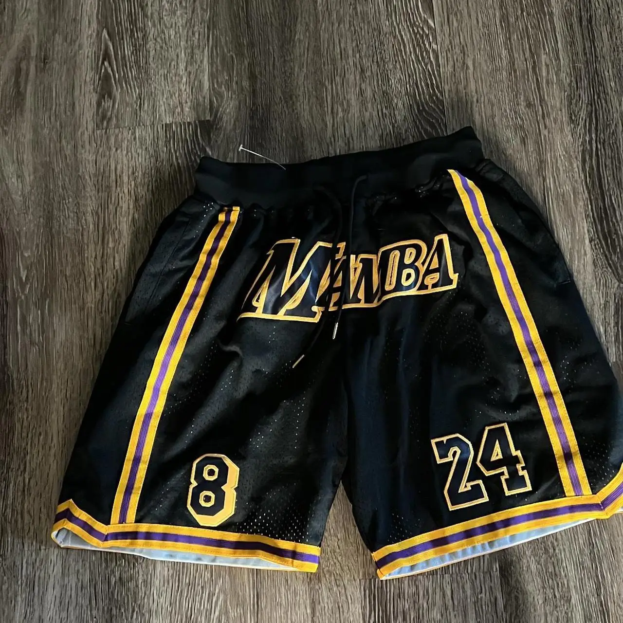 2026 الصيف الساخن بيع السراويل التجفيف السريع تنفس الرجال والنساء السراويل الرياضية عارضة فضفاض المألوف المتضخم السراويل