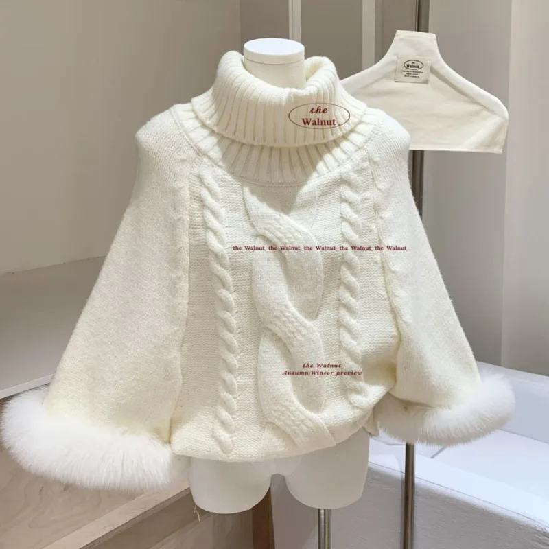 

​​Women's Chunky Cable Knit Turtleneck Sweater with Oversized Pom-Pom Cuffs - Soft Cream White Winter Pullover for Autumn WInter