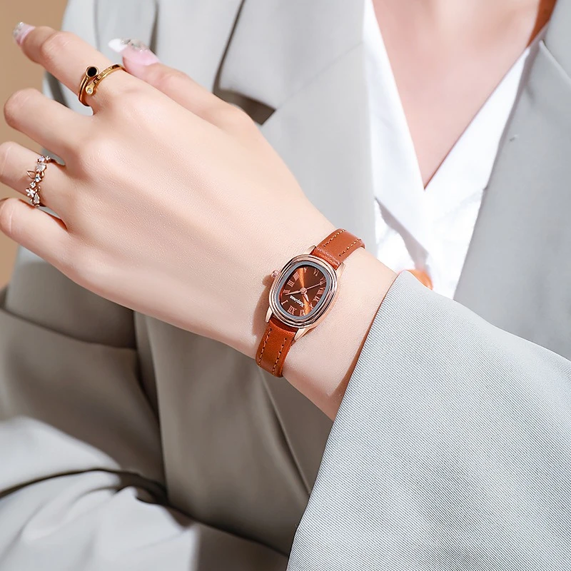 ساعة نسائية كورية نمط نسائي بيضاوي لوحة بسيطة حزام متخصص طالب مدمج شعور راقي