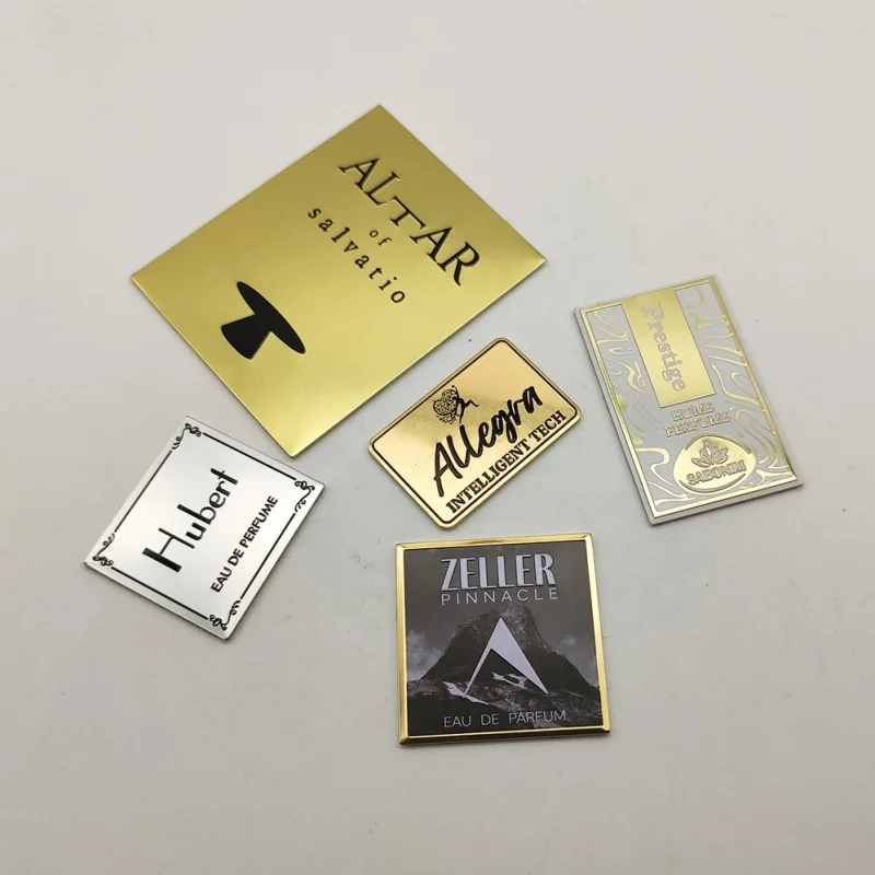 10 0.Zhang.Custom.2025 Hot Selling Custom 3d Logo Aluminum Embossing Label Personalized Golden label Perfume Packaging