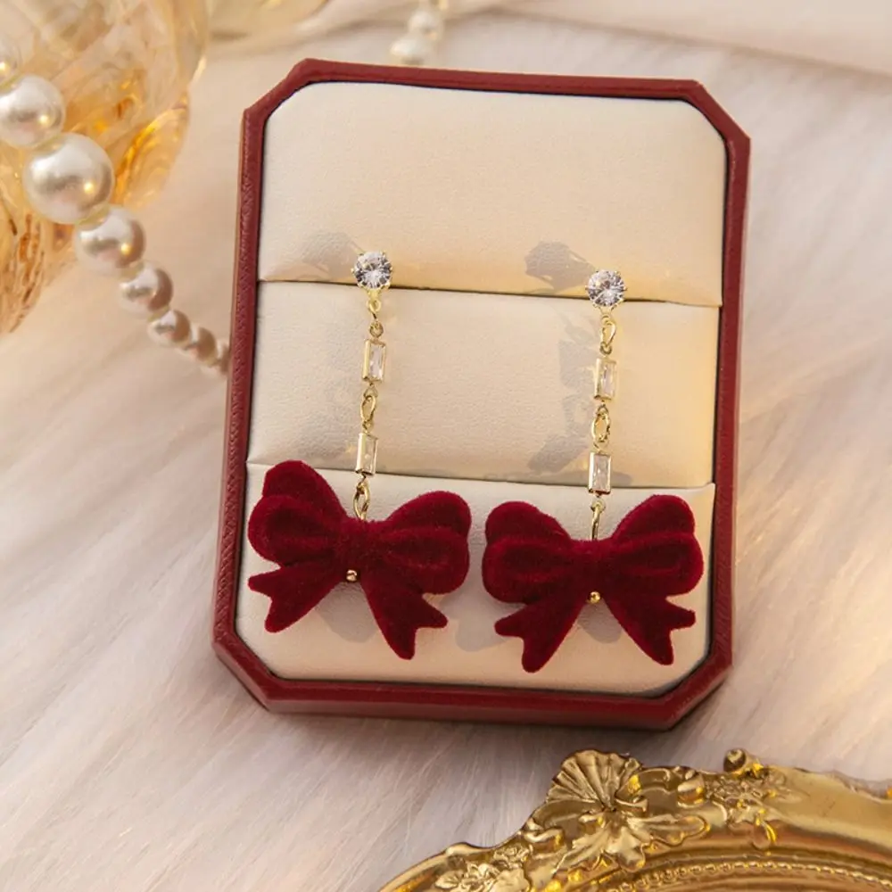 سبائك الزنك بورجوندي يتدفقون القوس أقراط مجوهرات حمراء القوس استرخى أقراط يتدفقون سلسلة شرابة طويلة هدية السنة الجديدة