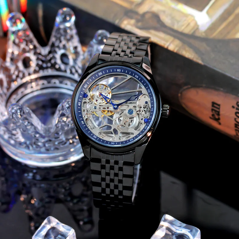 

A men's black steel band minimalist-style automatic mechanical watch with a five-pointed star and Arabic numerals