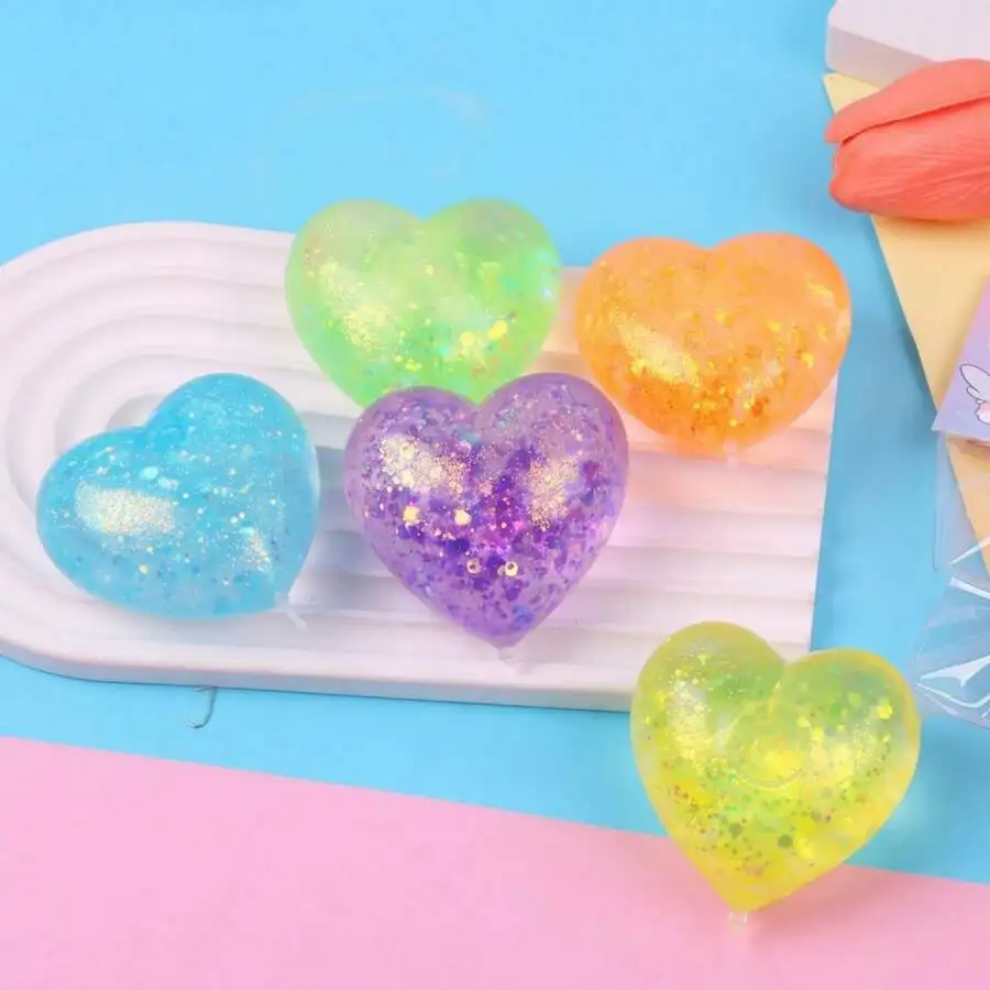 

1pc Glowing Heart-Shaped Squishy Toy: Shiny Transparent Heart-Shaped Squishy Toy, Soft Slow Rising, Suitable For Children And Adults, Great For Desktop Games And Stress Relief.