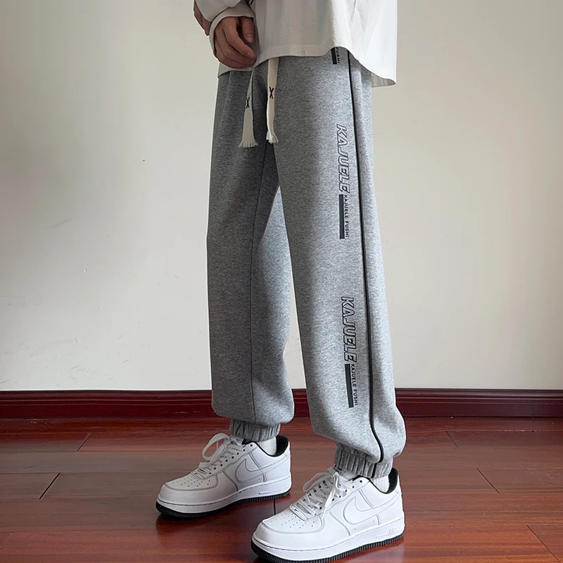 

Новинка 2023 года, мужские весенне-осенние свободные спортивные штаны с прямыми штанинами и манжетами, повседневные спортивные бегуны для подростков, универсальные длинные брюки