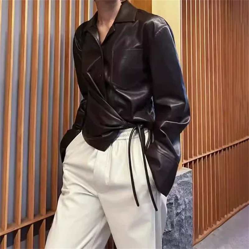 

Women's shirt New winter 2025 single breasted lapel long sleeved top Asymmetric lace up slim Women's blouse protein leather coat