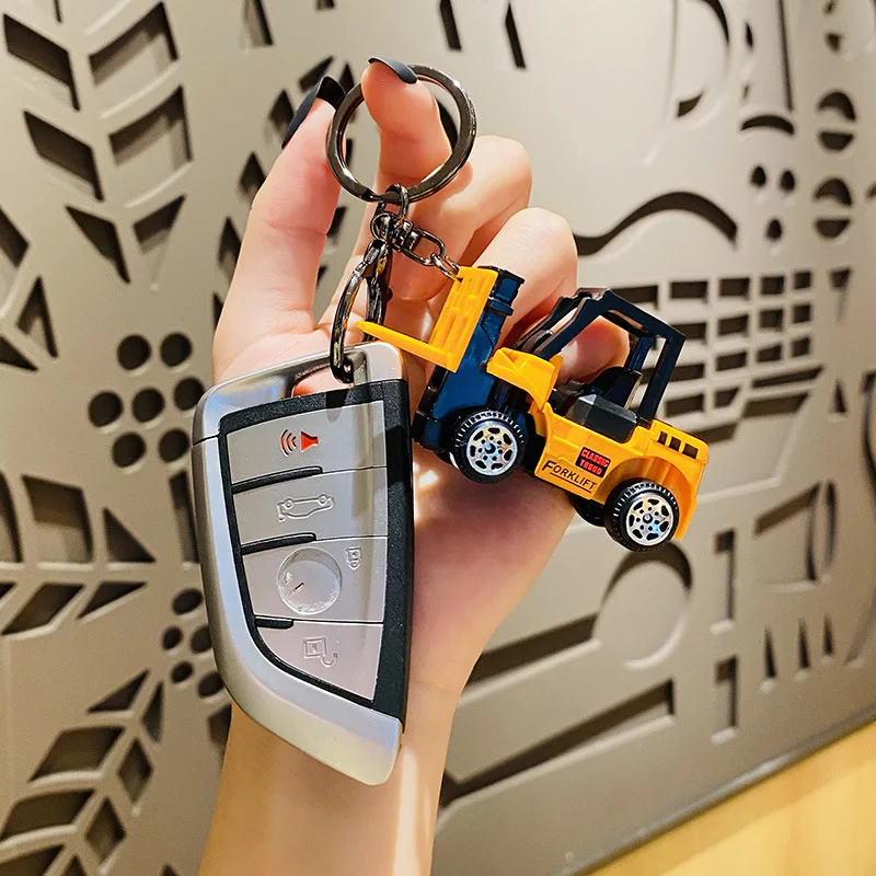 Creative Personality Alloy Engineering Car Excavator Key Chain Cartoon Forklift Roller Car Toy Keychain Student Bag Pendant Gift