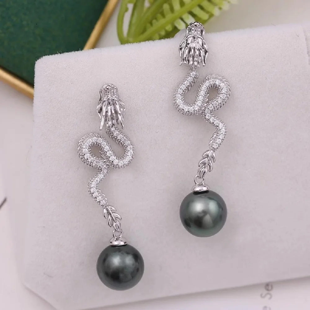 

2025 Новый жемчуг AAAA 9-10 мм 10-11 мм Натуральный круглый жемчуг Южного моря Серьги в форме дракона 925s