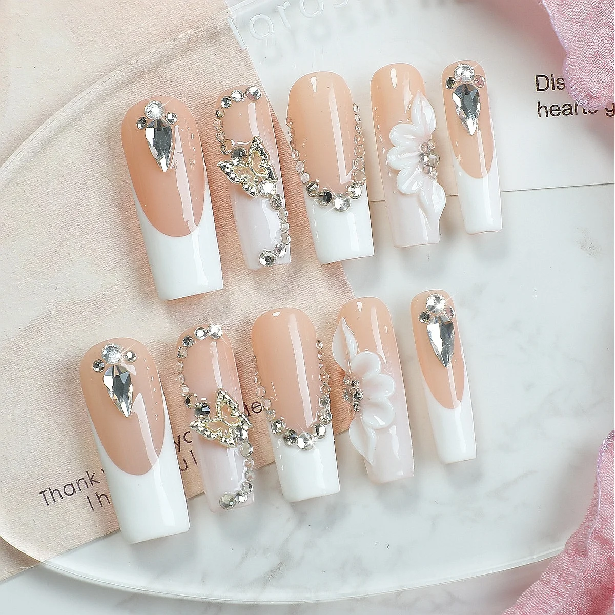 Elegante naakt-witte strass vlinderpersnagels (Cd008)
