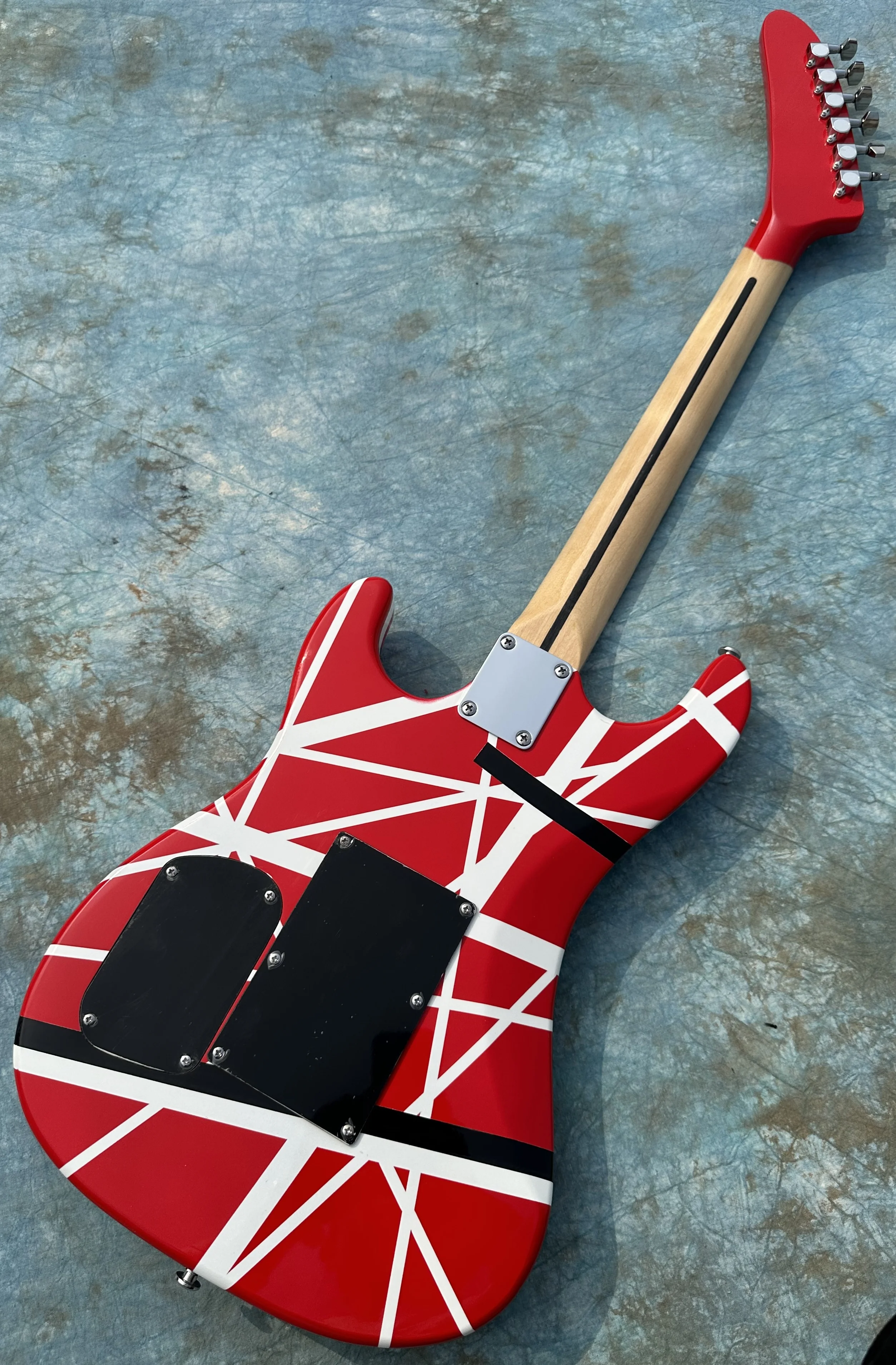 5150 electric guitar, imported alder body, Canadian maple fingerboard, signed, classic red and white stripes, lightning package