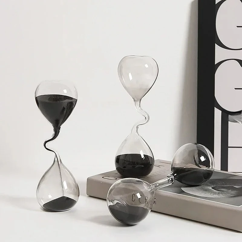 Minimalist Interior Dining Table Decoration with Black Modern Style Curved Design and Hourglass Glass Craftsmanship