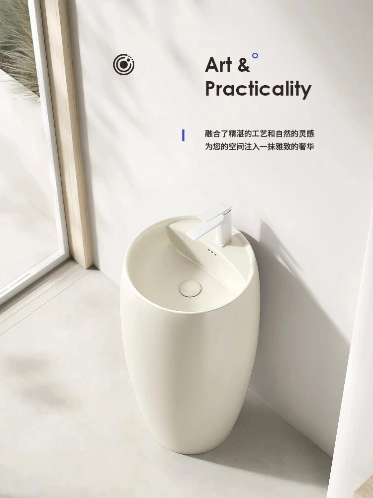 Lavabo a colonna in ceramica color crema, lavabo a pavimento, piccolo appartamento, hotel, bagno, tipo colonna