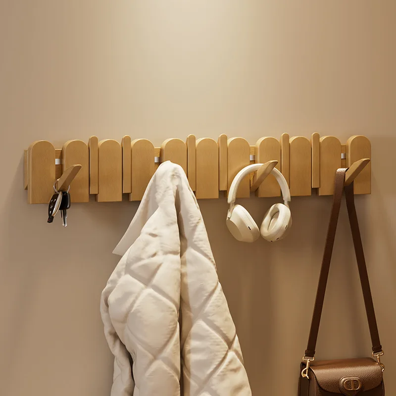 

hang hangers, solid wood coat hooks behind the door, wall hooks, no punching in the entrance, shelves do not hurt the wall