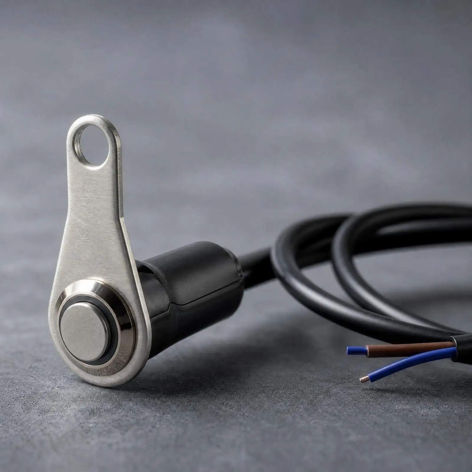 Compact wired push-button motorcycle switch with a metal finish