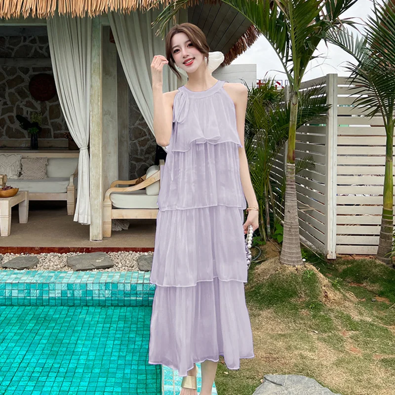 Vestido largo con cuello de temperamento francés para mujer, novedad de verano, vestido largo acampanado sin mangas con cuello redondo, vestido de vacaciones de Color sólido Fairycore