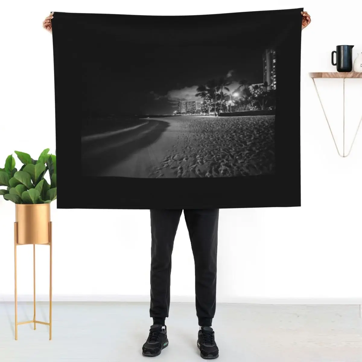 Beach palm trees and buildings of Waikiki from beach on tropical island night Throw Blanket