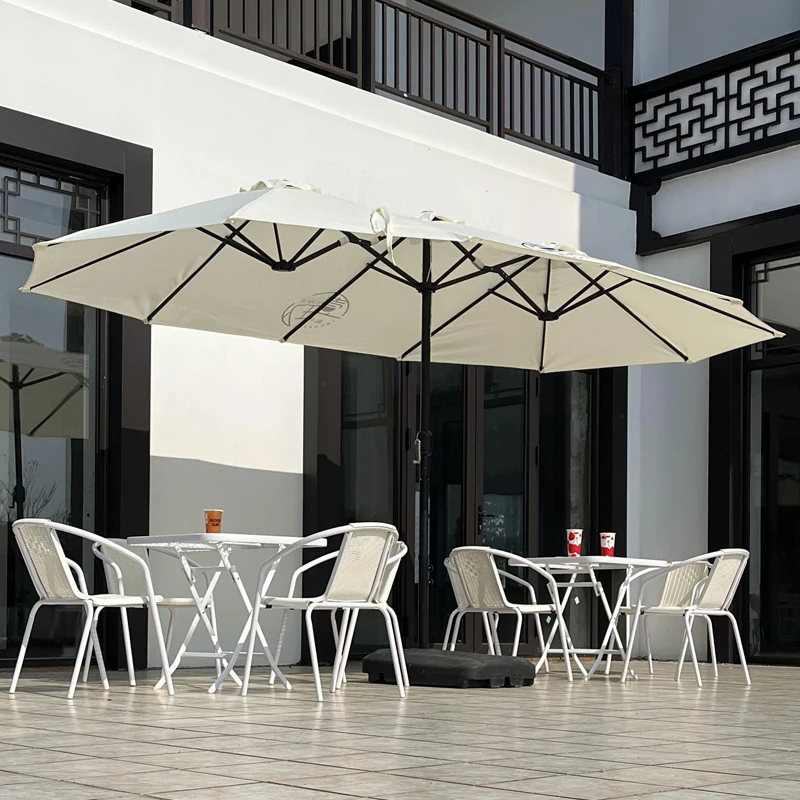 

Large commercial cafe with large parasol outside outdoor milk tea