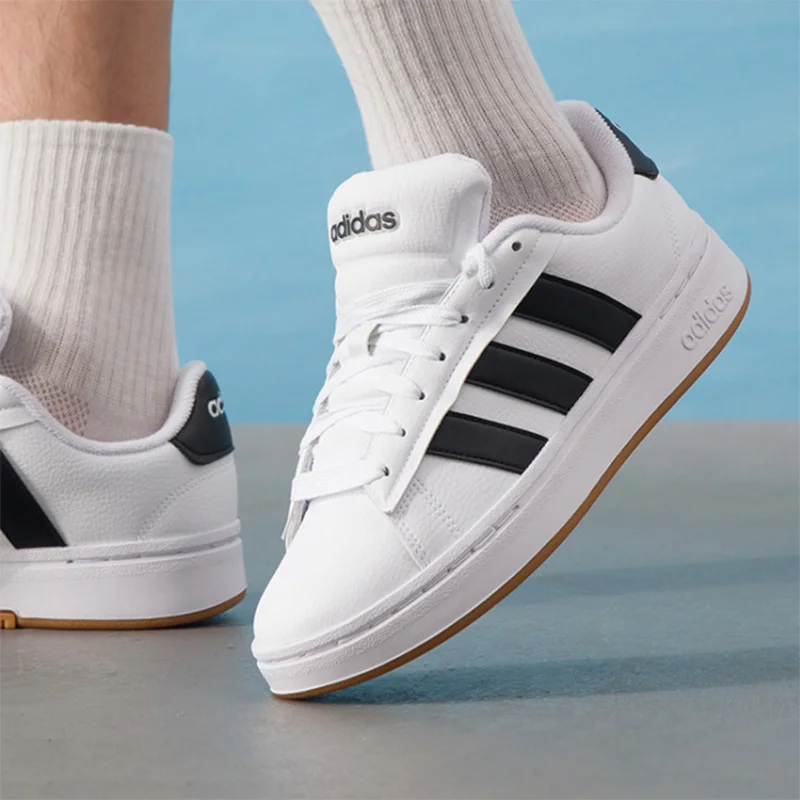 Zapatillas adidas blancas y negras de cuero con suela de goma, zapatillas clásicas de tres rayas, zapatillas informales de caña baja para hombre y mujer JQ2996