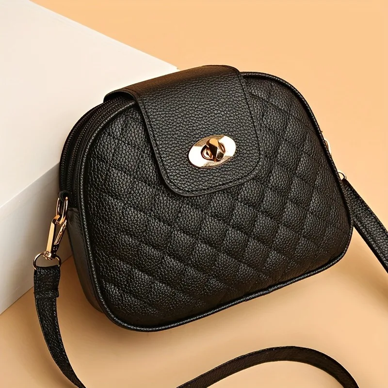 

New ladies shoulder bag fashion messenger bag mobile phone bag niche design rhombus bag multi-pocket small round zipper bag.