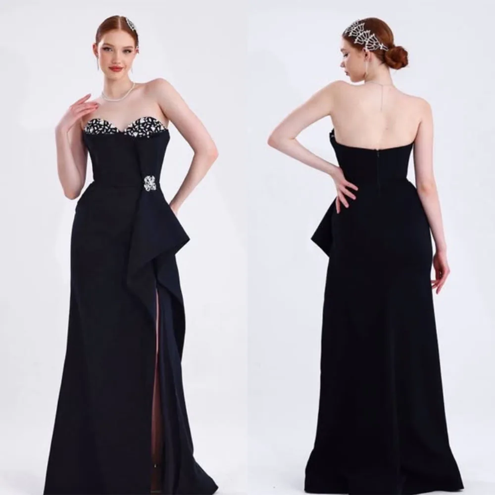 

High Quality Customized Floor Length Backless Beaded Black Sleeveless Evening High Fork Robe Pour Mariage Invité فساتين حفلات