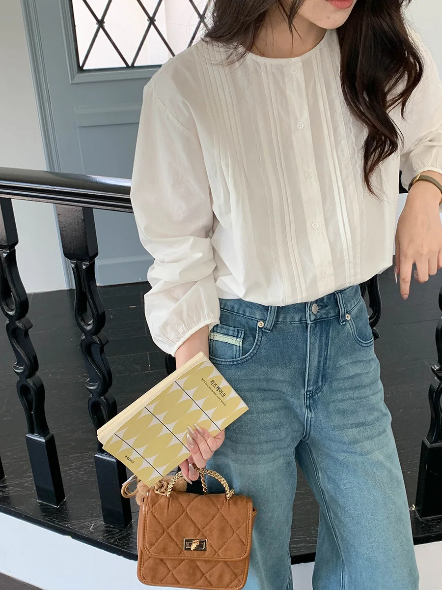

Spring and summer women's casual solid color round neck long sleeved loose shirt