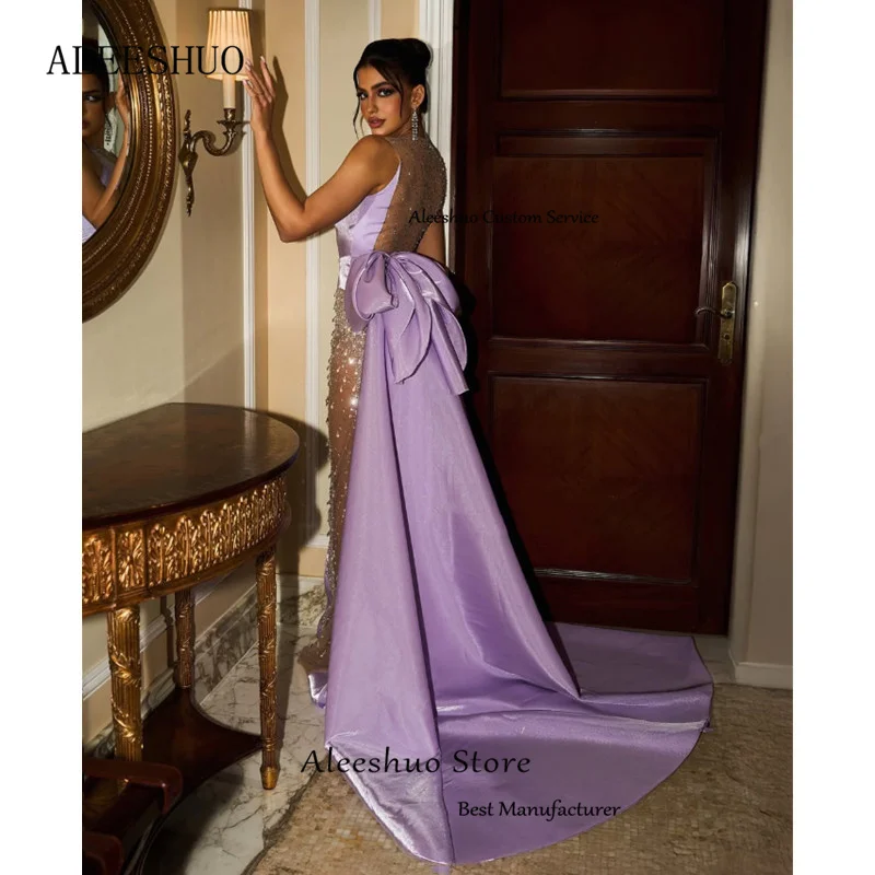 Moderne Satin-Meerjungfrau-Lila-O-Ausschnitt-lange Abendkleider, einfache Falte, Perlenstickerei, Kristall-Illusion, Seitenschlitz, rückenfrei, 2025 Maßgeschneidert