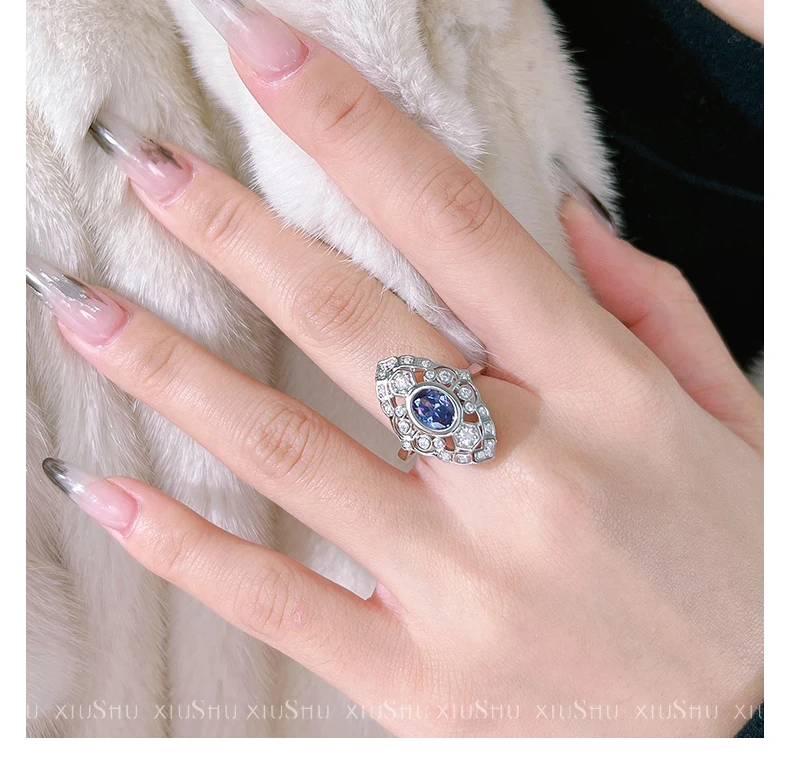 New hollow oval Tanzanian blue 925 sterling silver ring set with high carbon diamond micro inlay, niche wedding jewelry